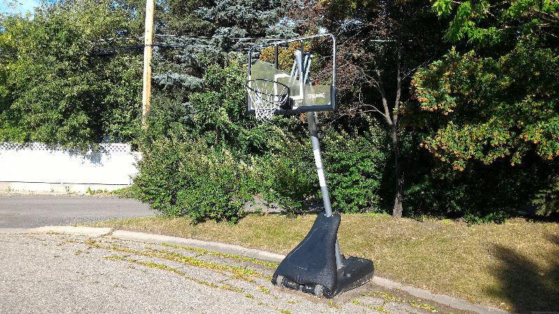 Moveable basketball net