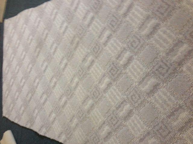 One new piece of berber carpet