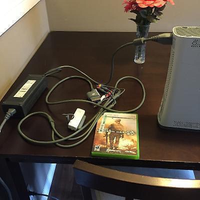 Xbox works great. +1 game and wireless adapter