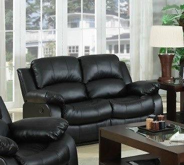 Midnight black bonded leather reclining love seat, NEW IN BOXES