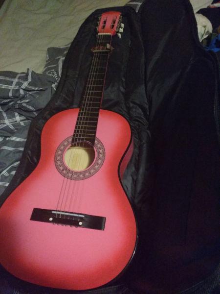 Acoustic guitar with accessories