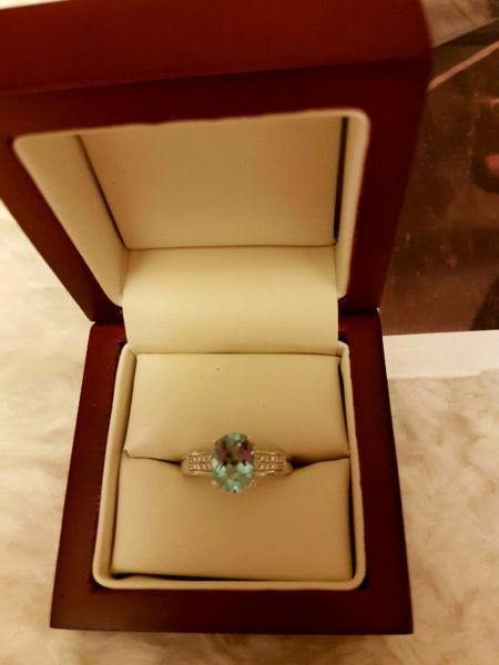 Beautiful blue topaz & diamond ring