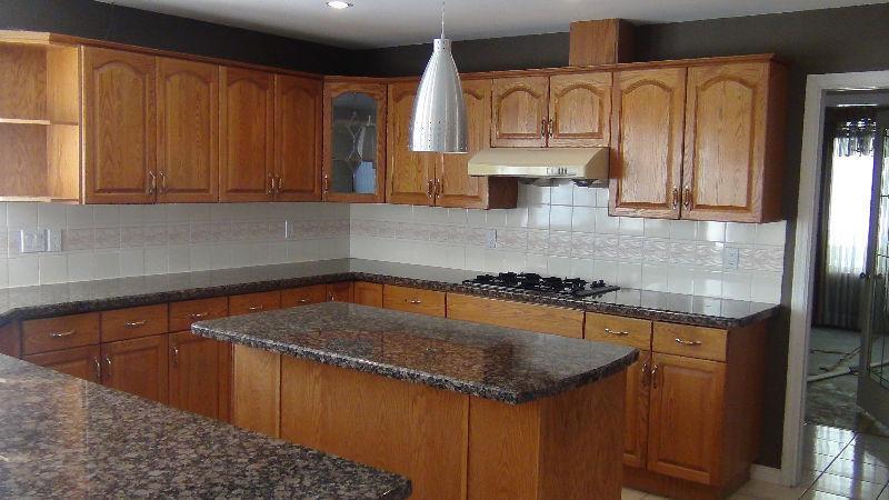 Large Solid Oak Kitchen with Granite Counter Tops