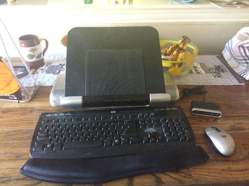 Laptop docking station with wireless keyboard and mouse