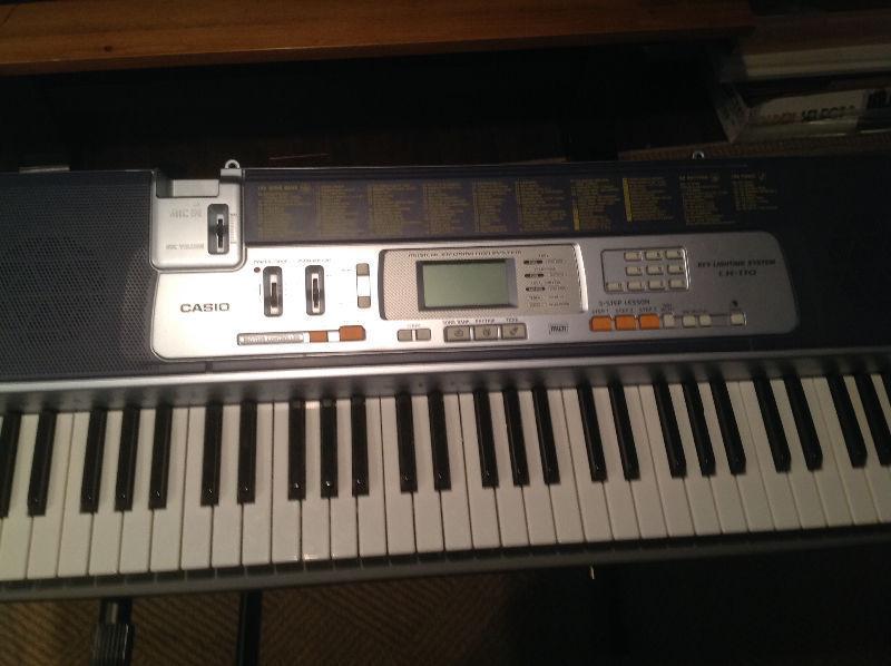 Casio keyboard with stand and bench