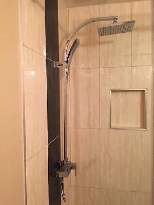 Glass shower doors and rain shower hardware