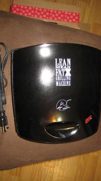 GEORGE FORMAN MEAN LEAN FAT GRILLING MACHINE