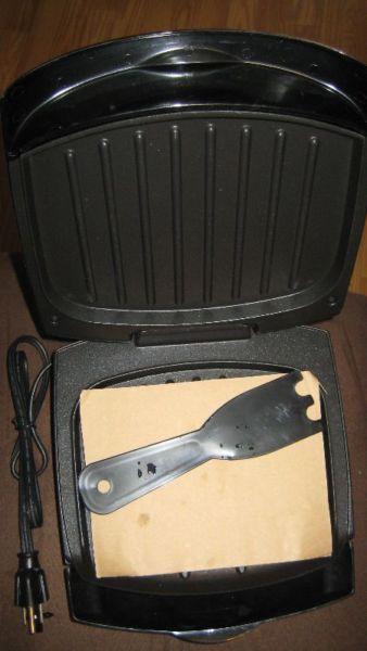 GEORGE FORMAN MEAN LEAN FAT GRILLING MACHINE