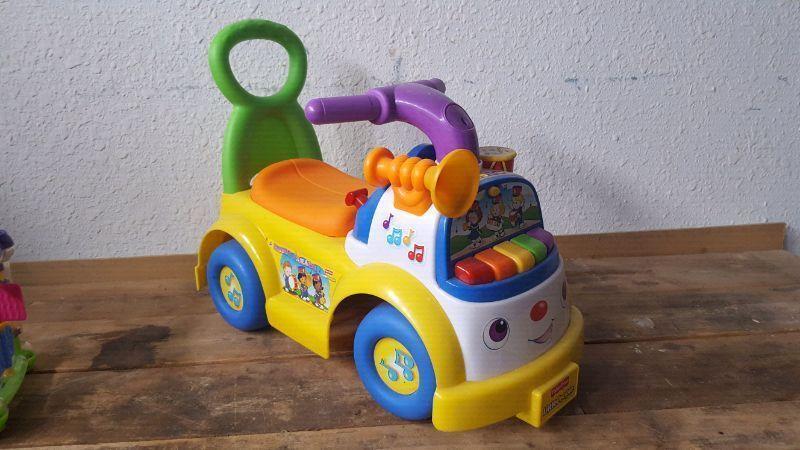 Fisher price music parade ride on toy