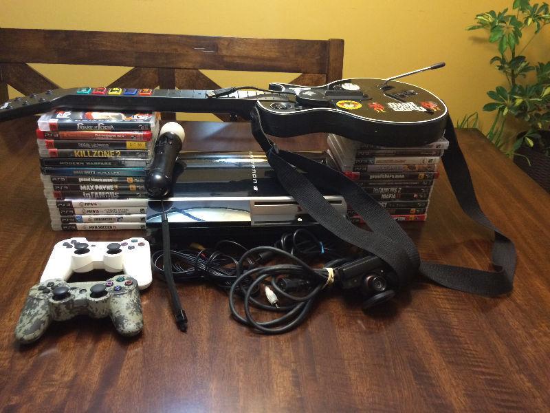 Used Playstion 3 for sale + 25 games (guitar hero included)