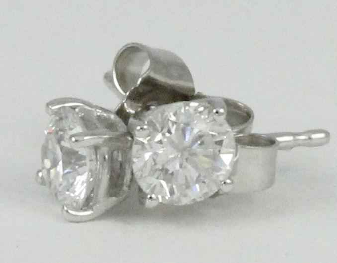 14k White Gold diamond solitaire earrings (0.70tdw, estate)#2456