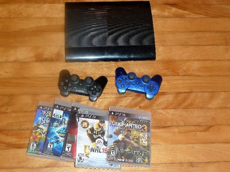 PS3 console with 2 controllers & 5 games 250 gb