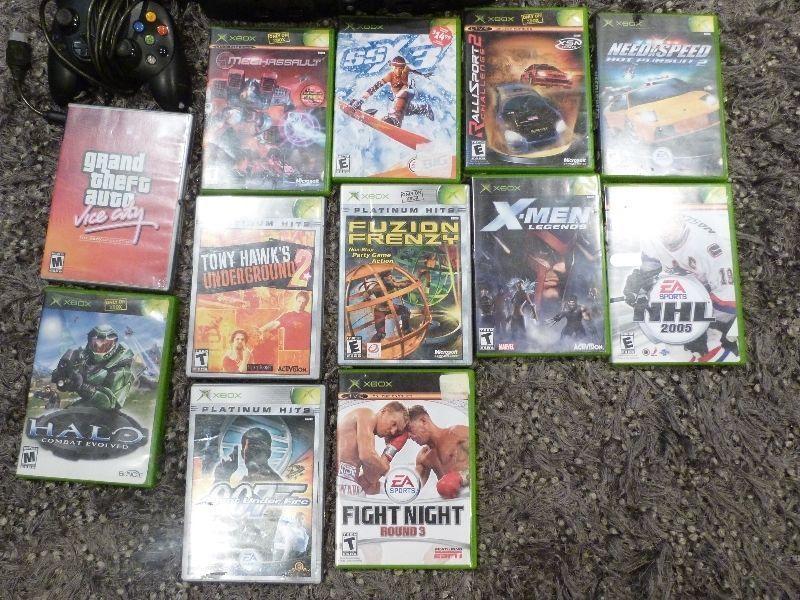 X BOX WITH 12 GAMES 3 CONTROLLERS
