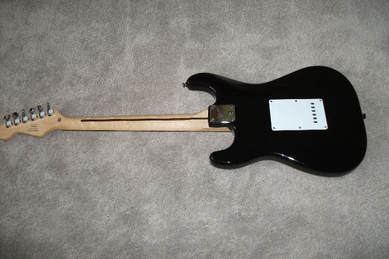 Mint Fender Squier/Gig Bag---Plus cash for your guitar