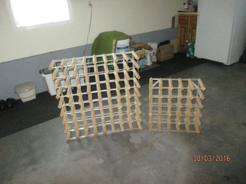Two wine racks for sale, one 64 and one 24