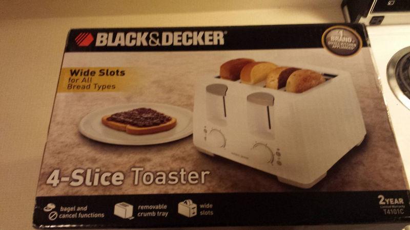 New toaster oven never use still in books not opened