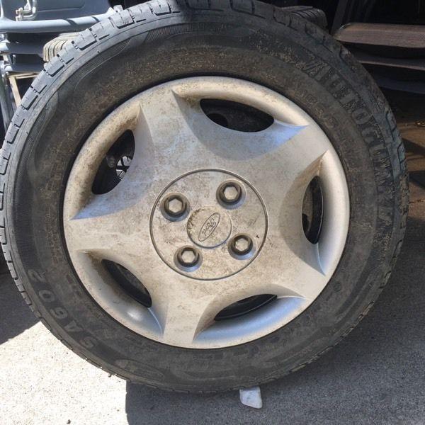 A set of 4 tires and rims for Ford Focus! 185 65 14
