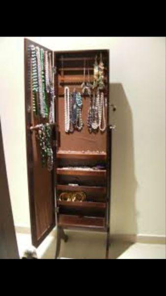Selling beautiful jewelry armoire excellent condition
