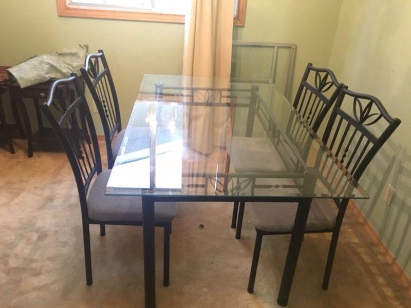 4 chairs one table and coffee table and 2 side tables