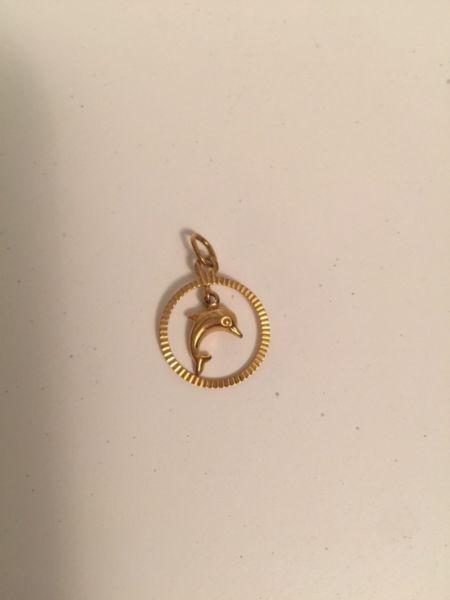 Solid gold dolphin pendant