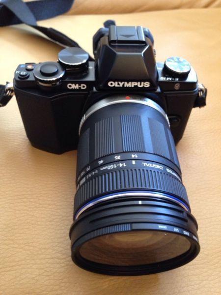 Olympus 0M-D E- M10 with 14 to 150 mm zoom lens