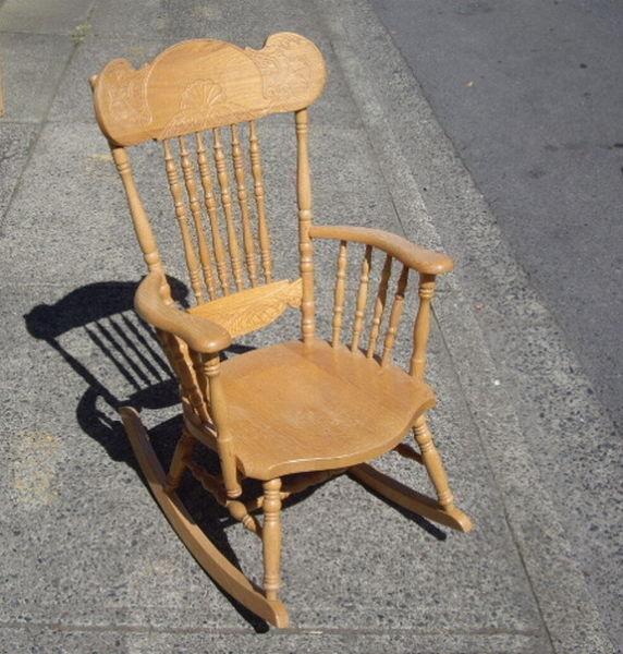 Beautiful Solid Oak Rocking Chair with Carved Design