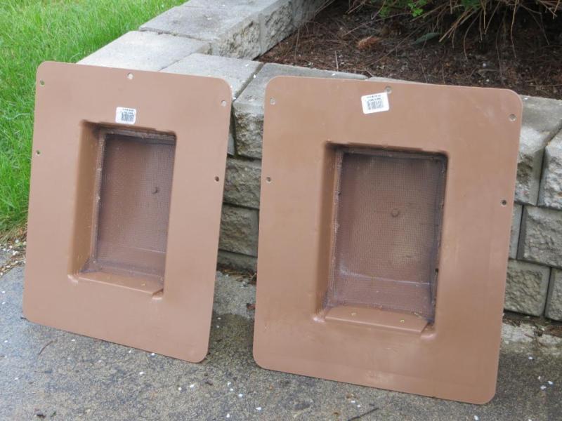 Two brown plastic Roofing vents