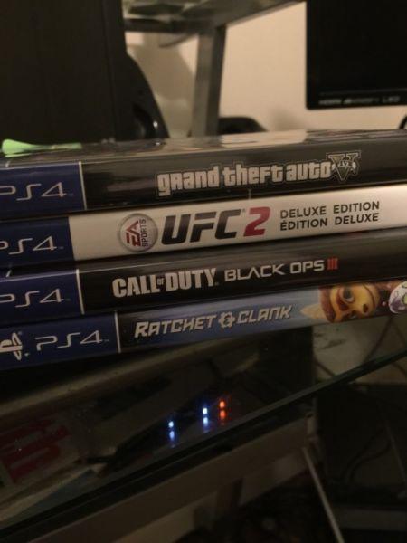 PS4 WITH 4 GAMES