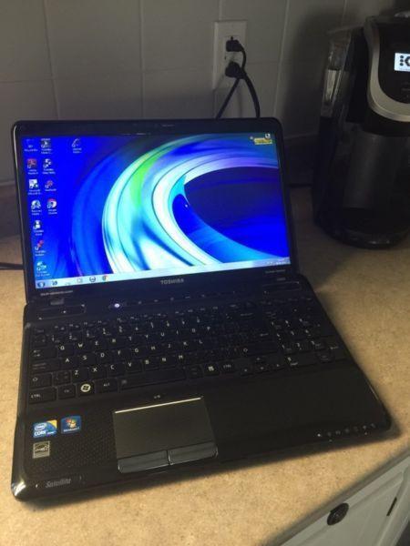 Toshiba core i3 wide screen laptop for sale.restore disk incl