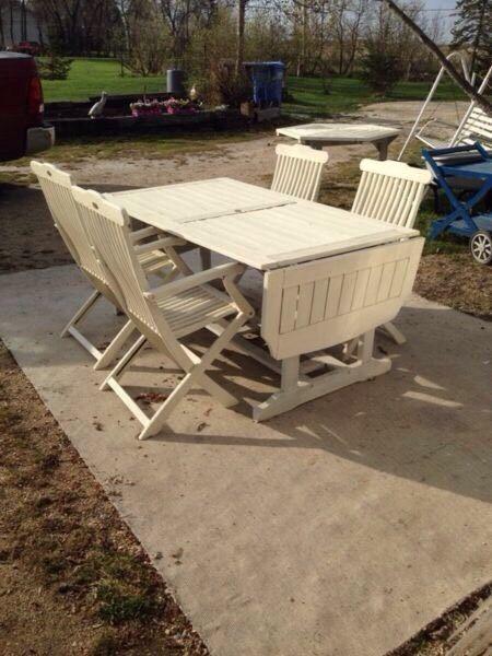 Solid wood patio table and 4 chairs