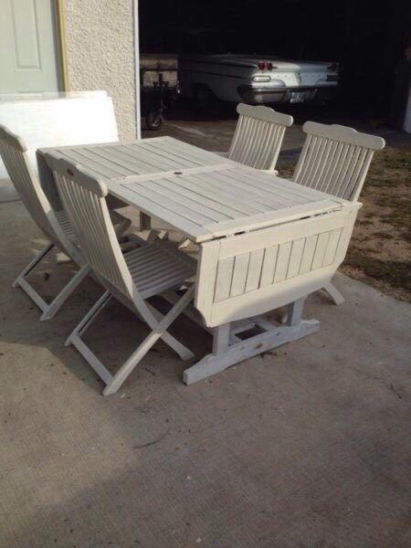 Solid wood patio table and 4 chairs