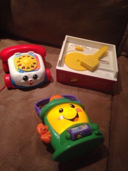 Fisher price record player and toys