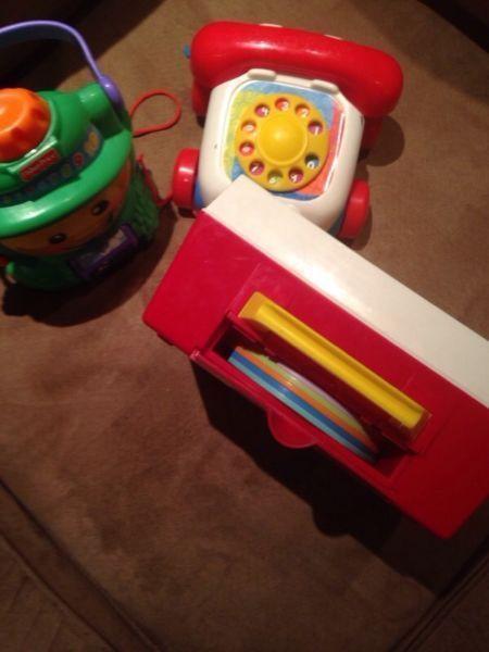 Fisher price record player and toys