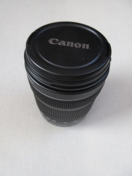 Canon EF-S 18 -135 mm 1:3.5-5.6 IS STM lens with cap covers