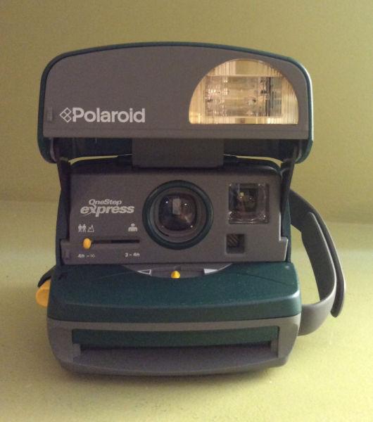 Mint-condition Polaroid One-Step 600 Express ($100)