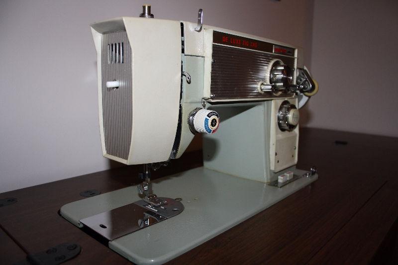 Sew Machine with case and Table on Wheels
