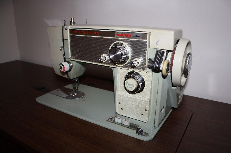 Sew Machine with case and Table on Wheels