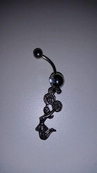 Cheerleader belly ring. Brand new. Never worn. Surgical steel