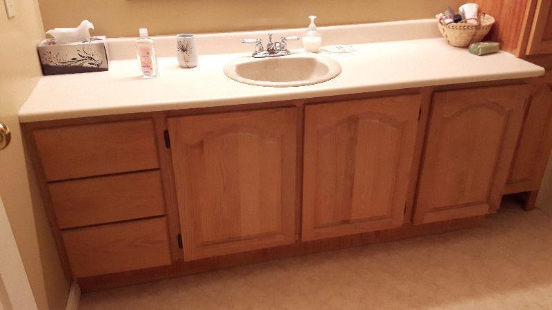 Oak cabinets, sink, taps, toilet, light fixture, bathtub etc