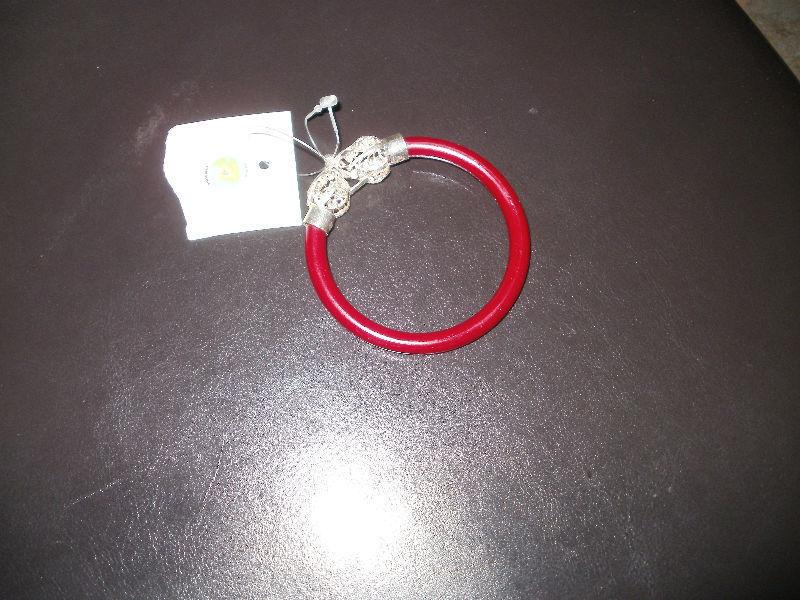 RED BRACELET WITH SILVER DESIGN