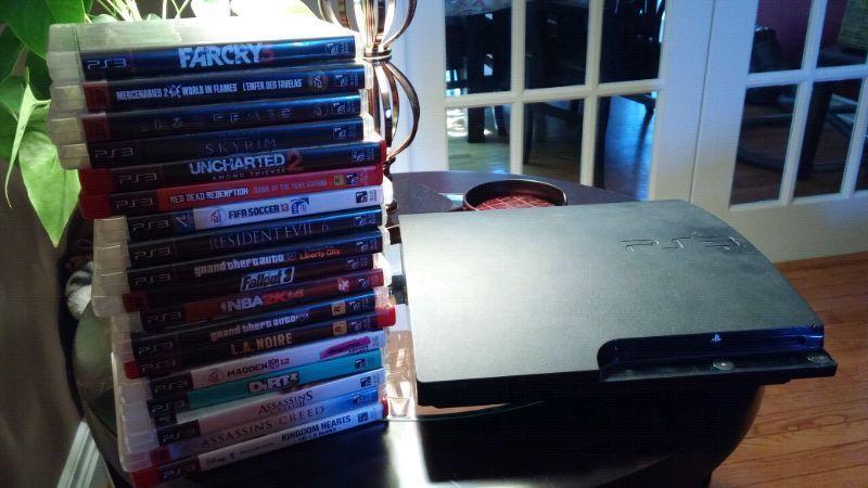 Playstation 3 w/ 2 wireless controllers and 18 games