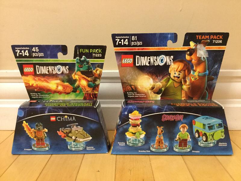 Two Lego Dimensions characters boxes. One fun pack,one team pack