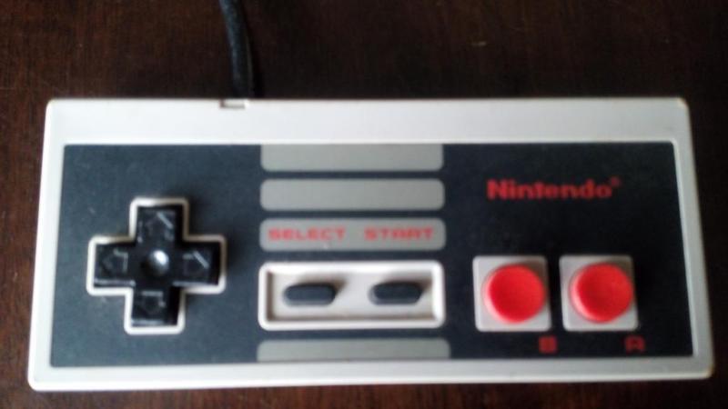 NES system, 2 controllers, light gun, all wires, 14 games
