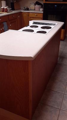 KITCHEN ISLAND WITH COOKTOP STOVE
