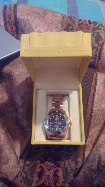 Mint condition never worn invicta gold watch