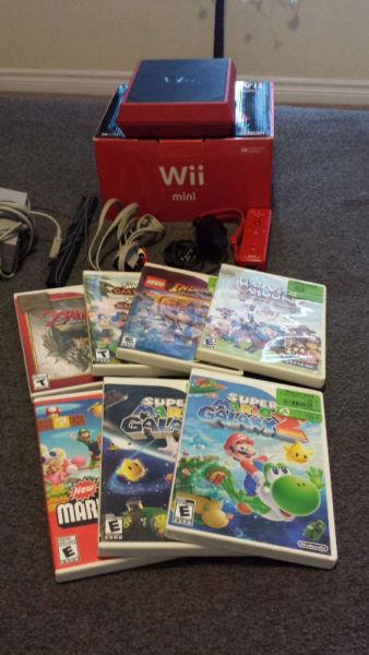 Wii mini in excellent condition w/ box, all accessories and game