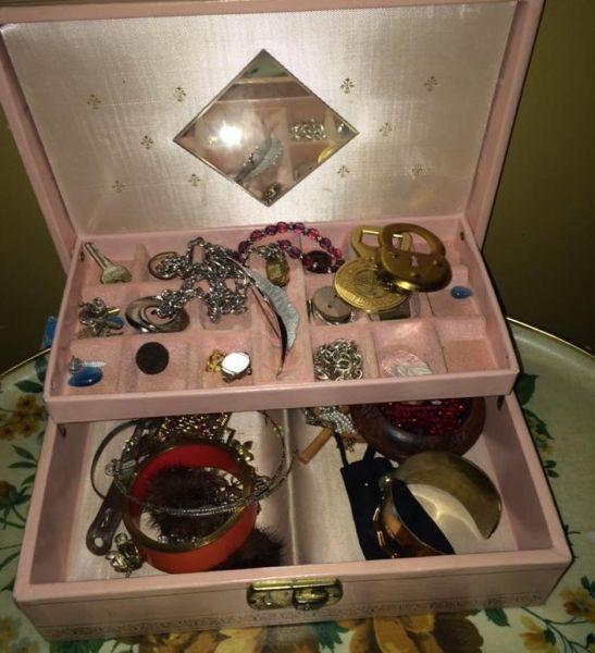 vintage musical jewelry box filled with jewelry