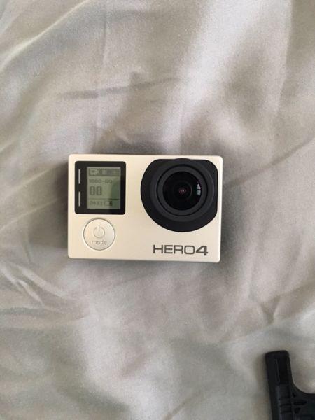 Go pro hero 4 with memory card and a floater