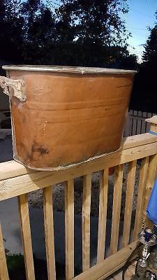 Old copper wash tub