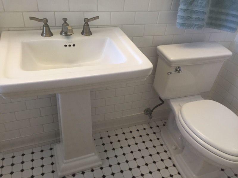 Pedestal sink, taps and toilet
